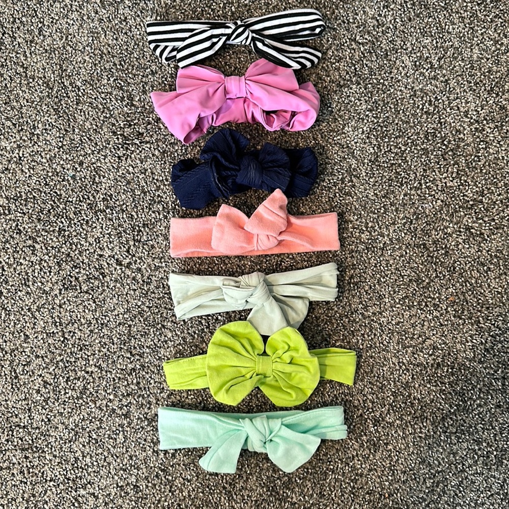 Set of 7 baby girl head bands/ bow wraps.